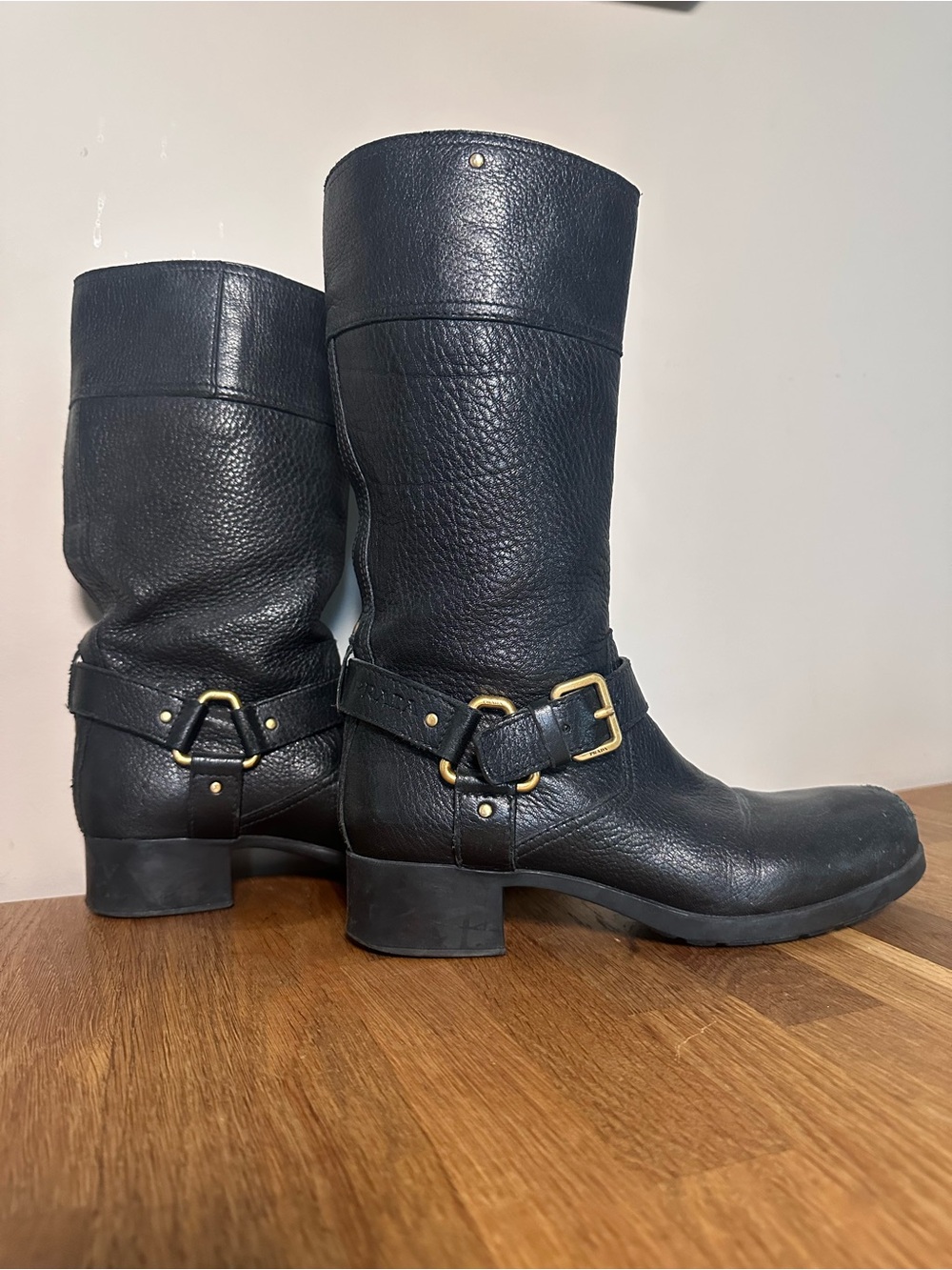 Black Leather Mid-Calf Riding Boots with Gold Buckle Detail